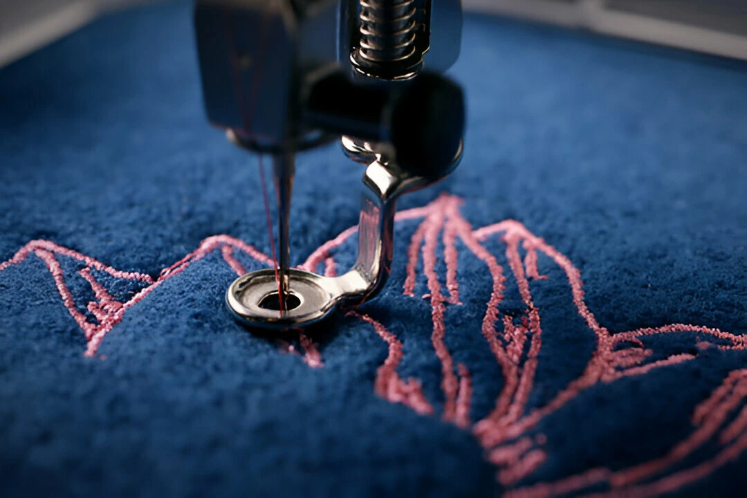 classic blue boiled wool and needle bar of a embroidery machine